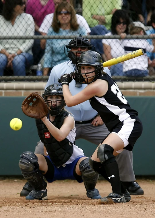 a softball player swinging a bat at a ball, happening, ap news, taken in the late 2010s, square, controversial