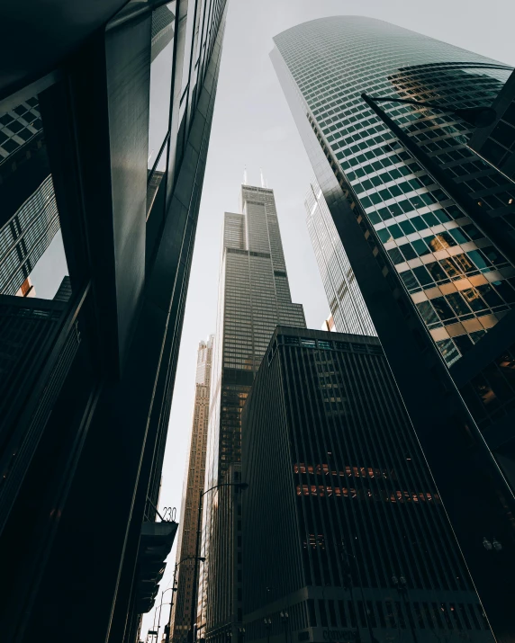 a couple of tall buildings sitting next to each other, unsplash contest winner, instagram post, concrete jungle, 2 0 2 2 photo