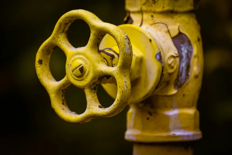 a close up of a yellow fire hydrant, pexels, process art, broken pipes, steel pipes, instagram photo, sink