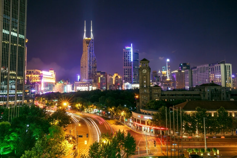 a view of a city at night from the top of a hill, by Zha Shibiao, pexels contest winner, square, shanghai, high quality image, postprocessed