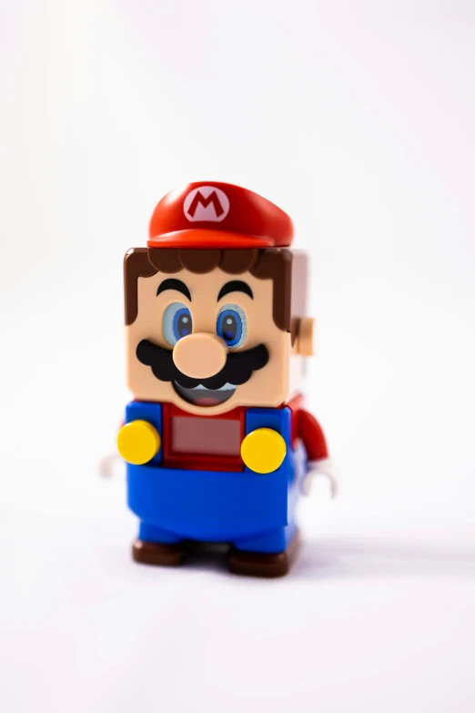 a lego figure of a man with a mustache, a picture, inspired by Mario Comensoli, unsplash, anime figurine, 2 5 6 x 2 5 6 pixels, video - game, wearing plumber uniform