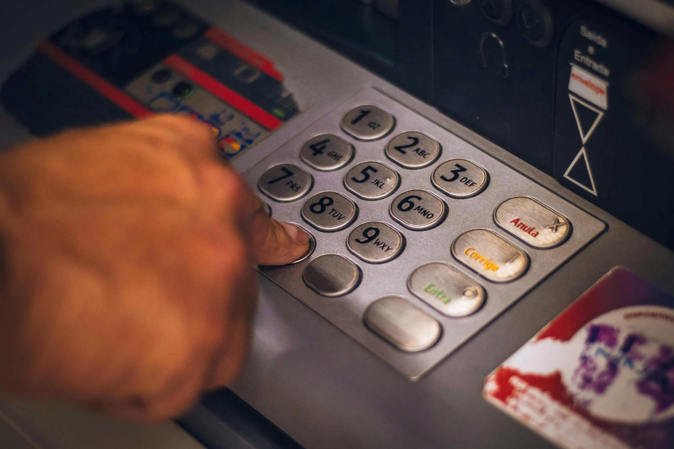 a close up of a person using an atm machine, by Matt Stewart, multiple stories, lachlan bailey, teaser, dsrl photo