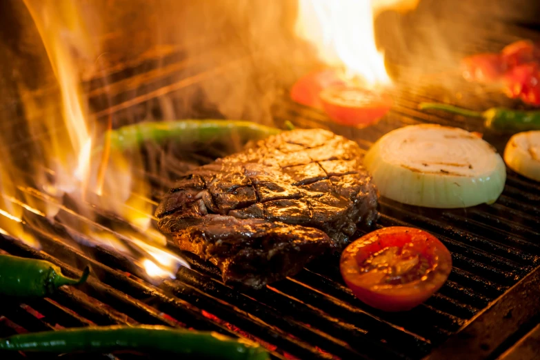 a steak and vegetables cooking on a grill, by Joe Bowler, pexels contest winner, renaissance, fire lit, background image, multicoloured, restaurant exterior photography