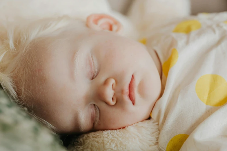 a close up of a baby sleeping with a teddy bear, pexels contest winner, albino white pale skin, thumbnail, portrait of small, digital image