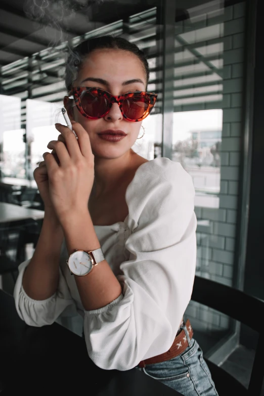 a woman in a white shirt smokes a cigarette, a cartoon, inspired by Elsa Bleda, trending on pexels, arabesque, red sunglasses, wears a watch, icon, hearts