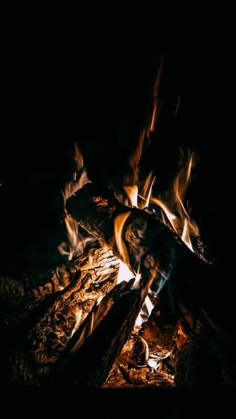 a close up of a fire in the dark, by Daniel Lieske, pexels contest winner, warm wood, outdoor photo, instagram photo, lachlan bailey