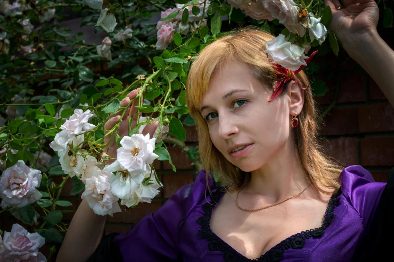 a woman in a purple dress with flowers in her hair, inspired by Konstantin Somov, pixabay contest winner, renaissance, cinematic outfit photo, portrait image, portrait of kim petras, rose twining