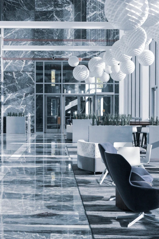 the lobby is clean and ready for us to use, a digital rendering, unsplash contest winner, light and space, blue marble, detail shot, photorealistic ”, graphic”