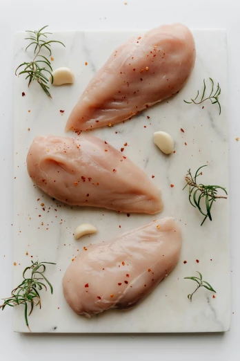 three raw chicken breasts on a marble cutting board, by Carey Morris, renaissance, 6 pack, birdseye view, pine, multi-part
