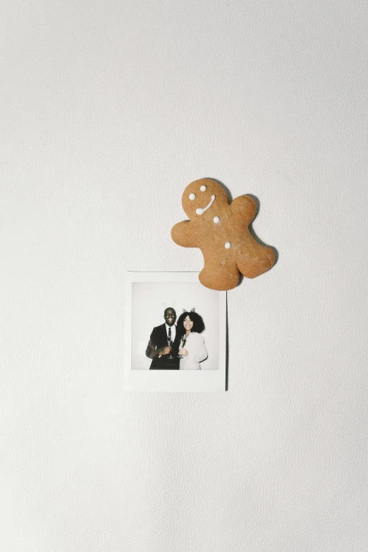 a gingerbread in the shape of a man and a woman, a polaroid photo, by Nyuju Stumpy Brown, curated collections, - 9, small