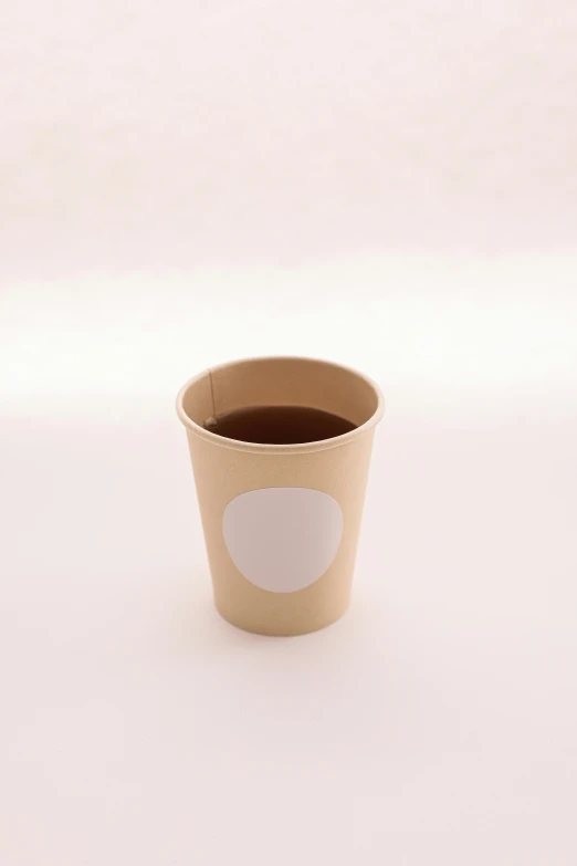 a cup of coffee sitting on top of a table, detailed product image, brown holes, without duplicate image, product display photograph