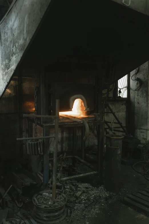 a room that has a fire in it, machinery, 1990s photograph, forge, taiwan