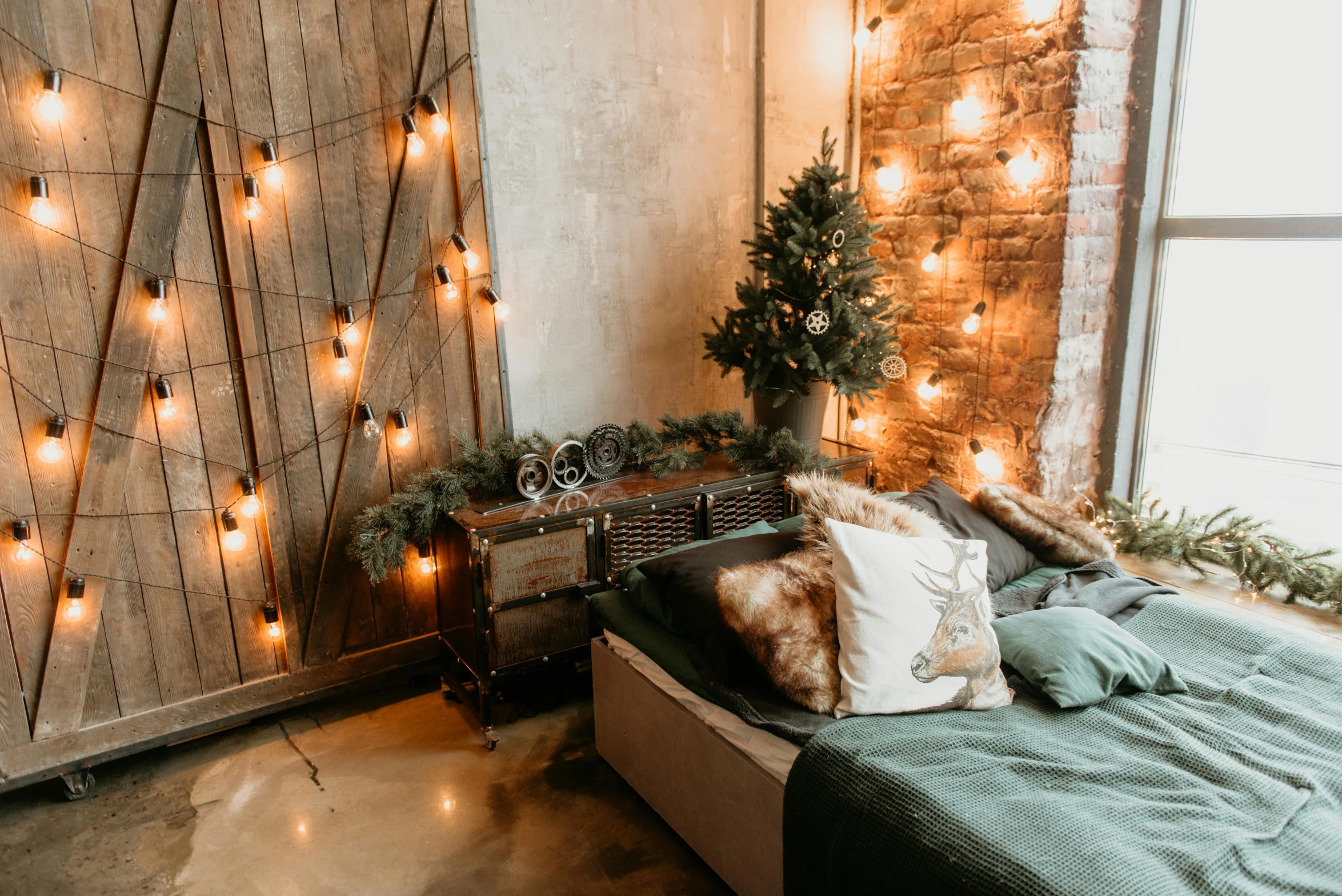 a bed sitting in a bedroom next to a window, inspired by Elsa Bleda, pexels contest winner, maximalism, christmas lights, romantic greenery, thumbnail, rustic