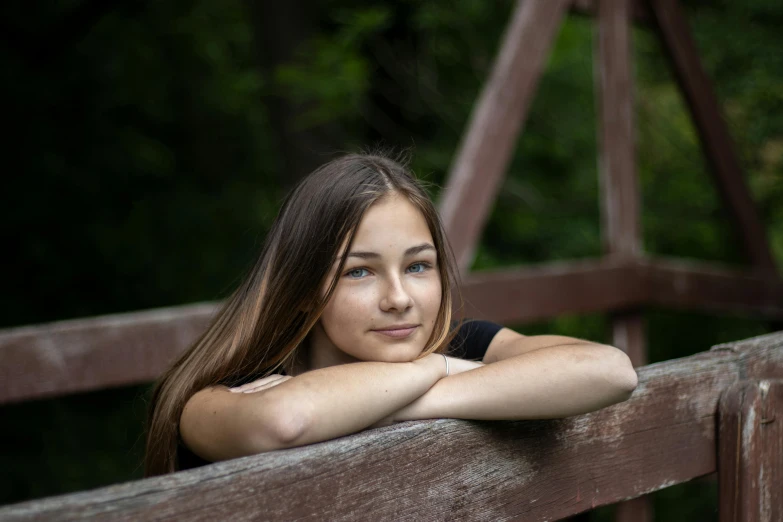 a beautiful young woman sitting on top of a wooden bridge, a portrait, by Winona Nelson, pexels contest winner, renaissance, aged 13, headshot portrait, 🤤 girl portrait, slightly tanned