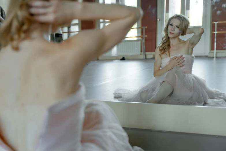 a woman in a white dress sitting in front of a mirror, pexels contest winner, arabesque, wearing a pink romantic tutu, cinema still, in the morning, stretch