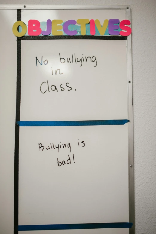 a white board with some writing on it, bullying, high class, paul barson, null