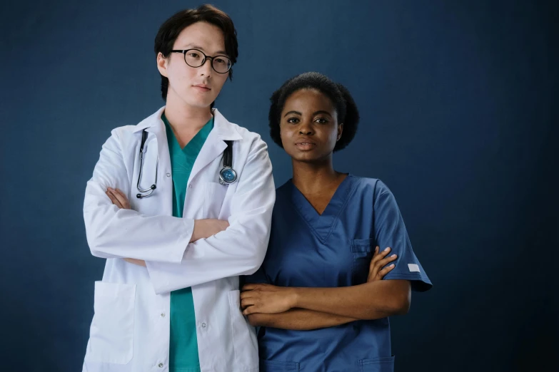 a couple of women standing next to each other, (doctor), with a white complexion, qirex, asian descent