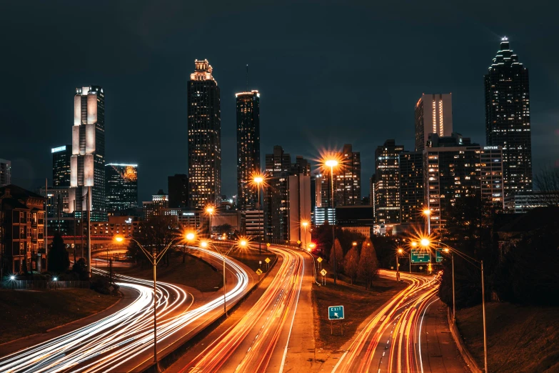 a city street filled with lots of traffic next to tall buildings, unsplash contest winner, hurufiyya, blue and orange rim lights, thumbnail, skyline showing, full size
