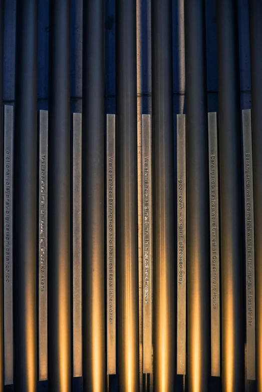 a group of pipes sitting next to each other, an album cover, flickr, academic art, pipe organ, lines of lights, stainless steel, gray