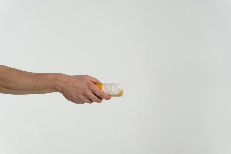 a person holding a donut with a bite taken out of it, a marble sculpture, by Daniel Seghers, plasticien, egg yolk, detailed product image, handheld, recognizable