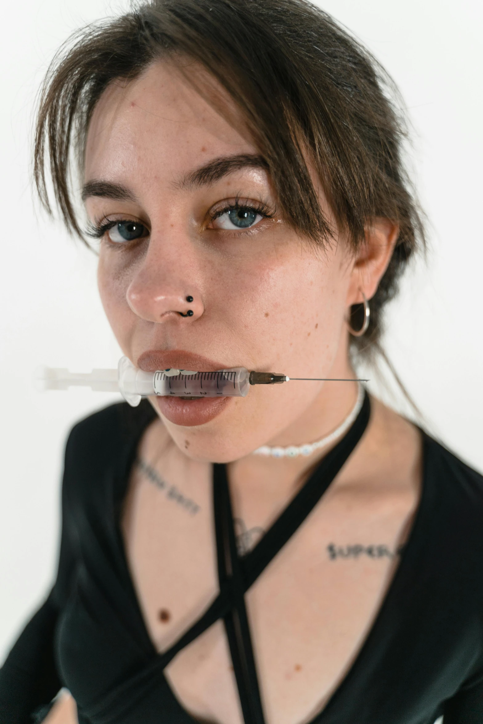 a woman with a needle in her mouth, inspired by Hedi Xandt, reddit, looking towards camera, charli bowater and artgeem, press shot, e - girl