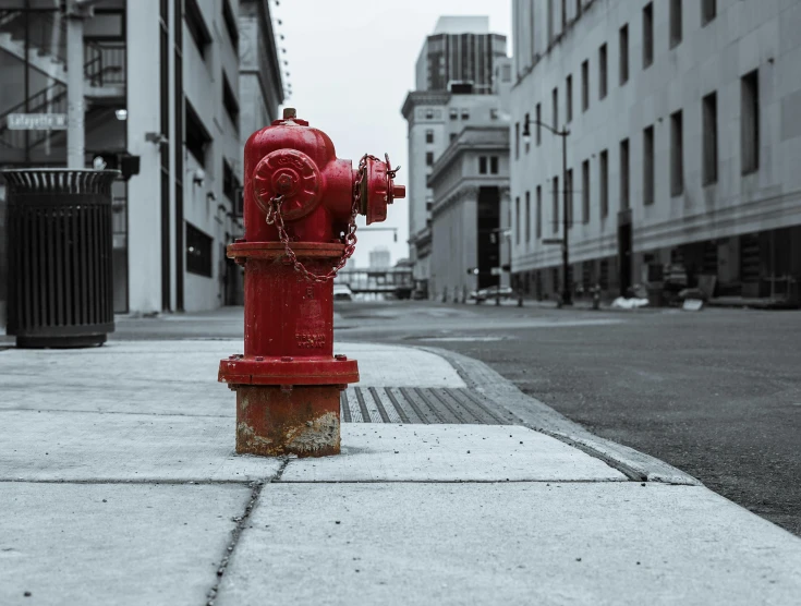 a red fire hydrant sitting on the side of a street, a photo, pexels contest winner, empty city, industrial pipes, instagram post, down-town