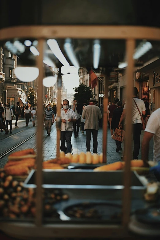 a group of people walking down a street, by irakli nadar, pexels contest winner, hyperrealism, food stall, turkey, medium format. soft light, city view