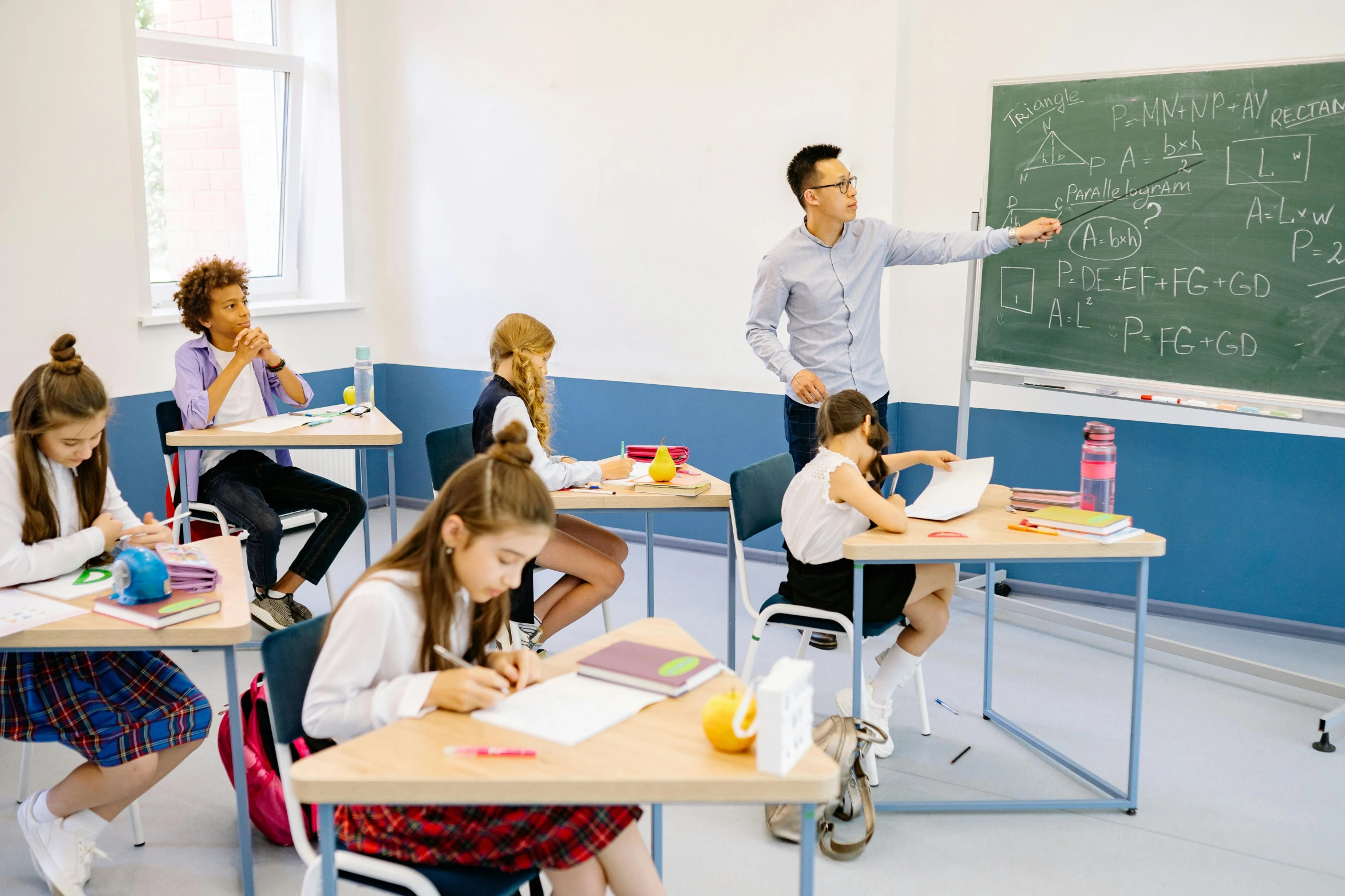 a group of children sitting at desks in a classroom, a cartoon, pexels contest winner, danube school, jin shan and ross tran, professor calculus, standing in class, lachlan bailey