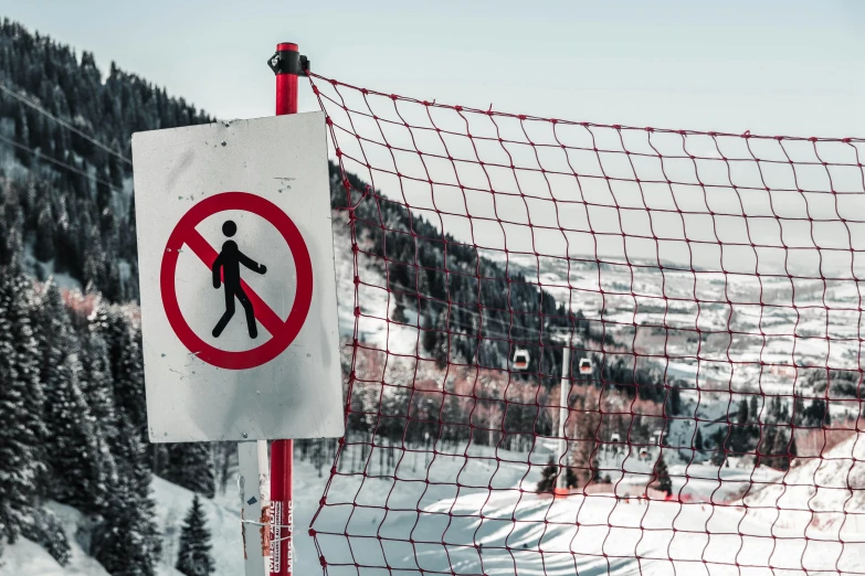 a red and white sign sitting on top of a snow covered slope, by Sven Erixson, pexels contest winner, plasticien, netting, no nudity, skiing, 🚿🗝📝