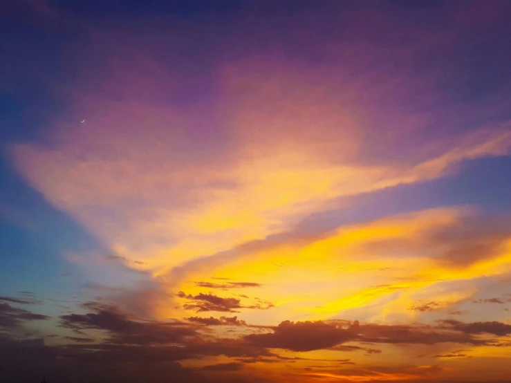 a large body of water with a sunset in the background, pexels contest winner, magical realism, colorfull sky, instagram post, yellow and purple tones, night sky; 8k