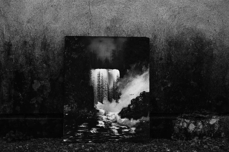 a black and white photo of a waterfall, an album cover, by Mirko Rački, pexels contest winner, surrealism, painted black, alternative reality mirrors, (fire), ffffound