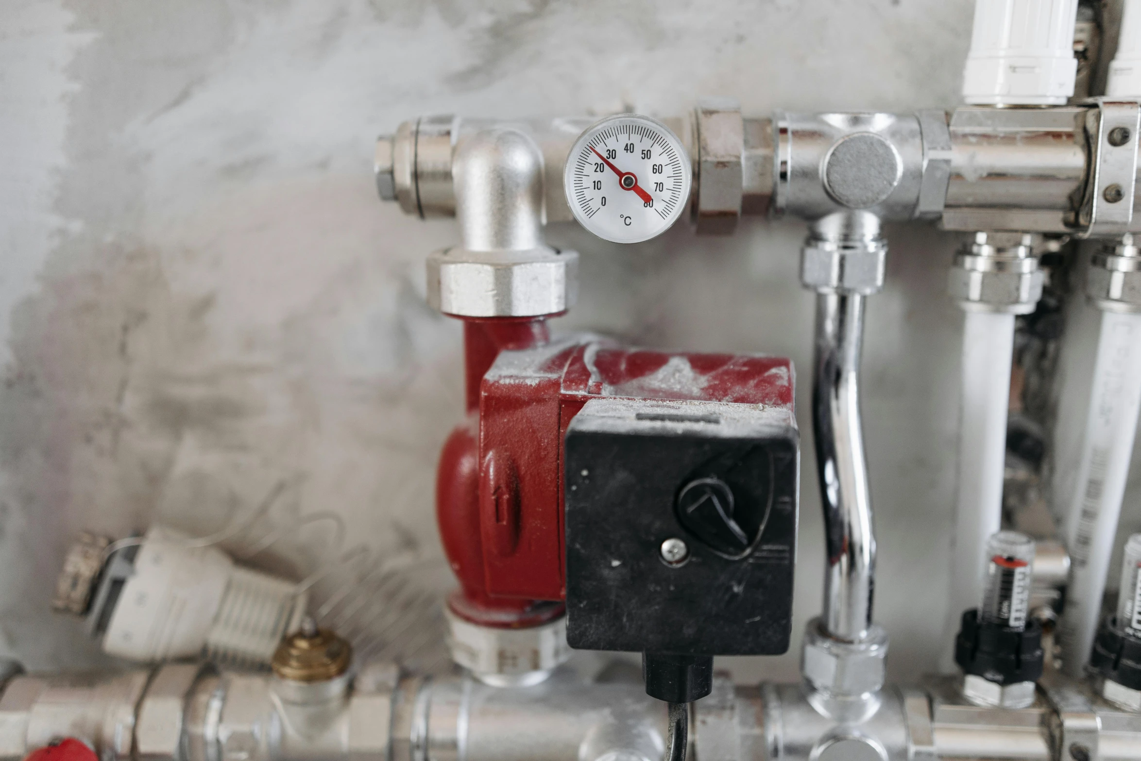 a close up of a red and silver fire hydrant, pexels contest winner, glowing heating coils, inside a frame on a tiled wall, gauges, detailed product image