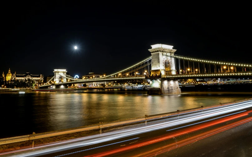 a long exposure photo of a bridge at night, pexels contest winner, art nouveau, budapest street background, 8k resolution”