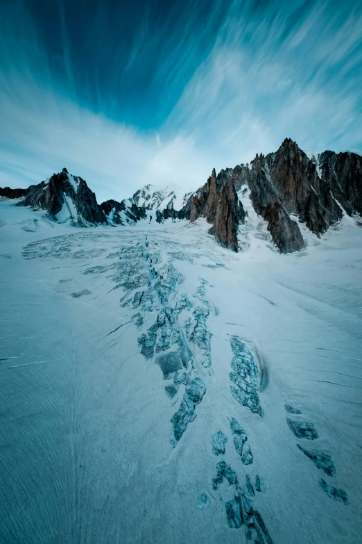 footprints in the snow with mountains in the background, by Pierre Mion, glacier landscape, epic 8 k, chamonix