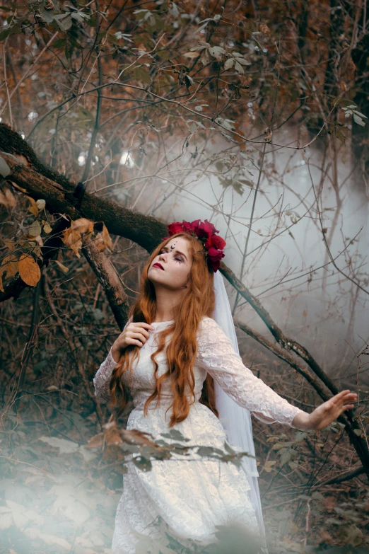 a woman in a wedding dress standing in a forest, an album cover, inspired by Elsa Bleda, pexels contest winner, pre-raphaelitism, a redheaded young woman, beautiful witch spooky female, or perhaps a fairy tale, the flower crown