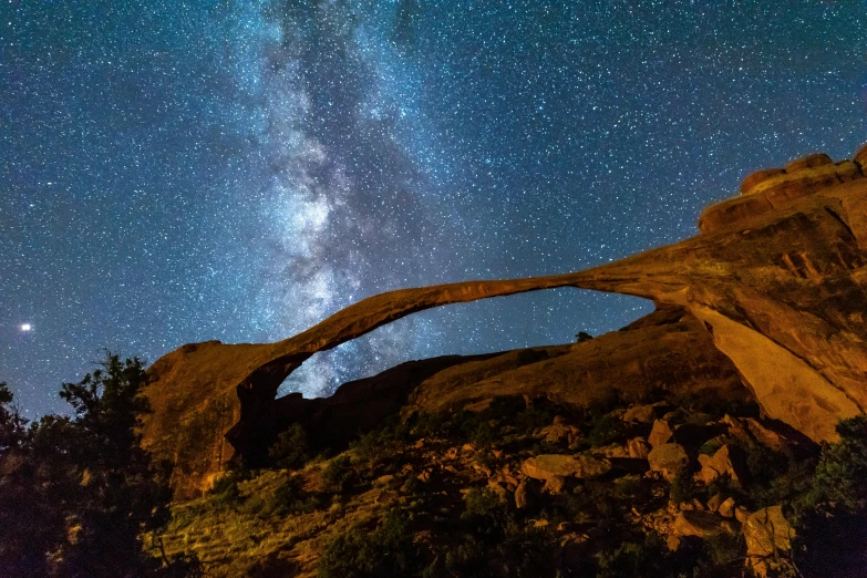 a rock formation with a milky in the background, by Josh Bayer, unsplash contest winner, renaissance, arching milkyway, sky bridges, moab, 2 5 6 x 2 5 6 pixels