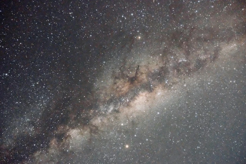 a night sky filled with lots of stars, pexels, light and space, the midjourney multiverse, neck zoomed in, the milk way, southern cross