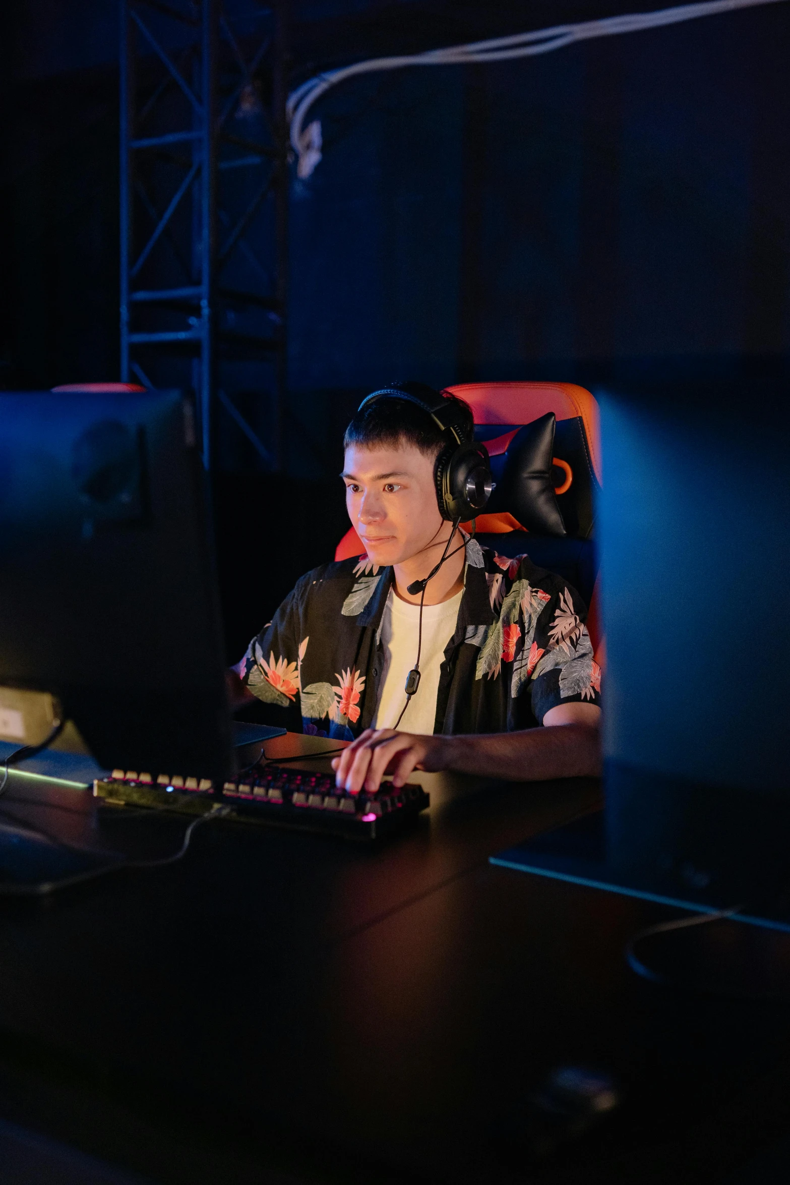 a man sitting at a desk in front of a computer, esports, shot with sony alpha 1 camera, penguinz0, asian man