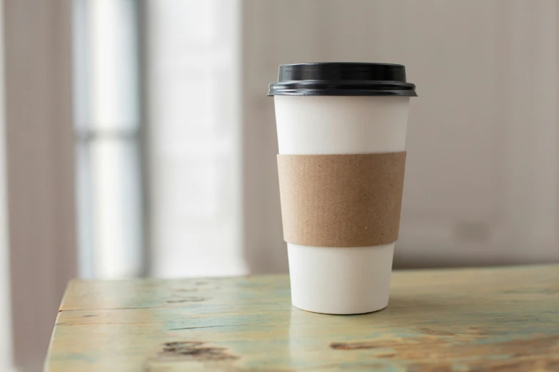 a coffee cup sitting on top of a wooden table, by Gavin Hamilton, private press, paper cup, large tall, unblur, top lid