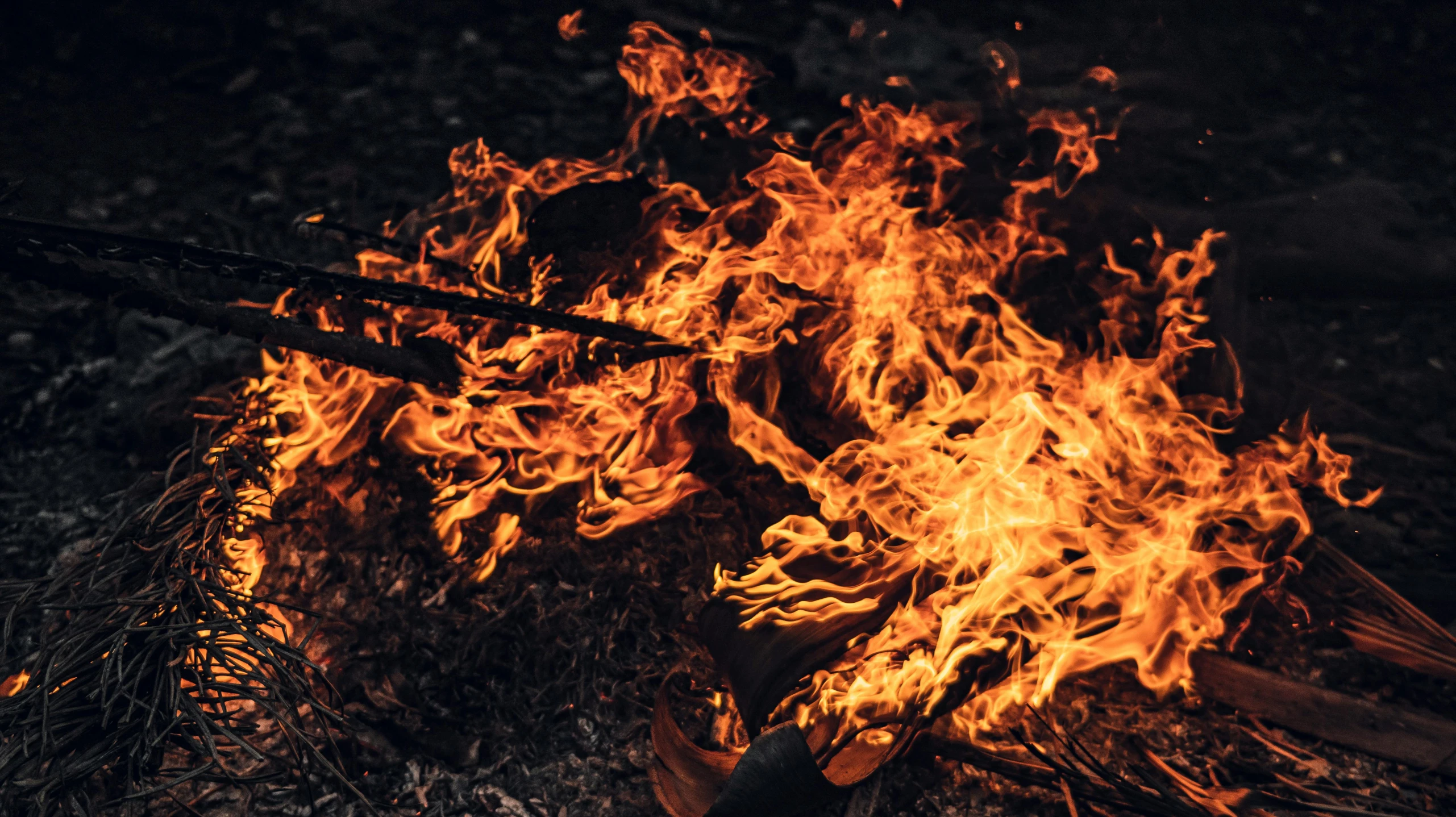 there is a fire that is burning on the ground, pexels contest winner, hurufiyya, avatar image, print ready, cooked