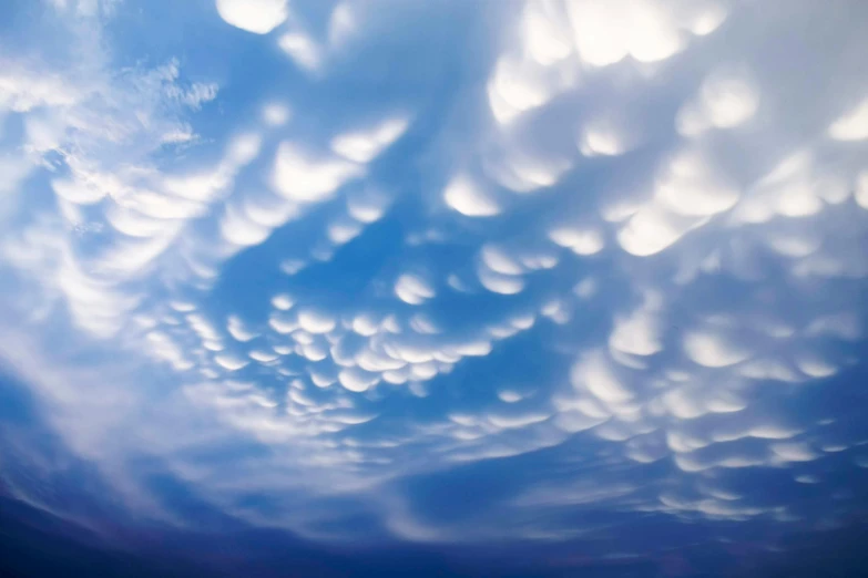 a sky filled with lots of white clouds, by Jan Rustem, unsplash, surrealism, mammatus clouds, fan favorite, swirley clouds, scientific photo