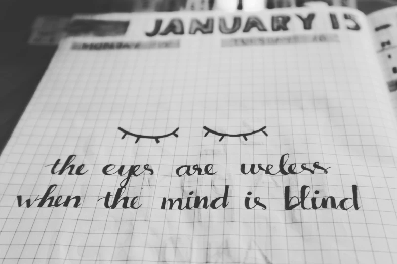 a piece of paper with a quote on it, a black and white photo, by Sydney Carline, trending on pexels, eye art, setting is bliss wallpaper, calligraphy formula, icy eyes
