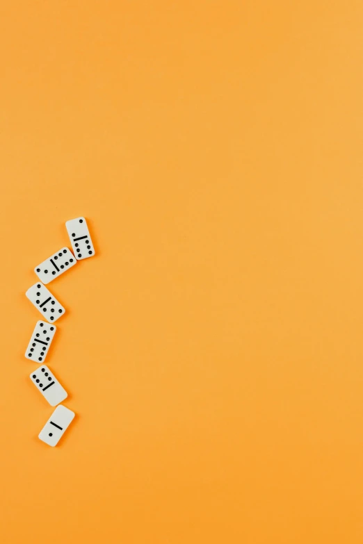 domino game pieces on an orange background, unsplash, conceptual art, thumbnail, white, square, background image