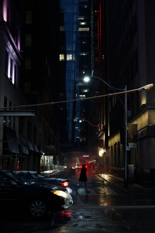 a person walking down a city street at night, inspired by roger deakins, unsplash contest winner, photorealism, ignant, gotham city, ominous photo, late morning