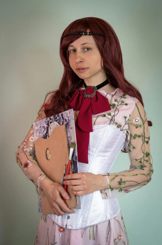 a woman in a dress holding a book, a character portrait, inspired by Konstantin Somov, featured on deviantart, portrait of hisoka hunter hunter, wearing lab coat and a blouse, photograph taken in 2 0 2 0, better known as amouranth