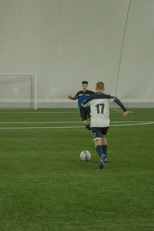 a group of young men playing a game of soccer, octane 8k, cinematography photo, 4 k hd film still, low quality footage