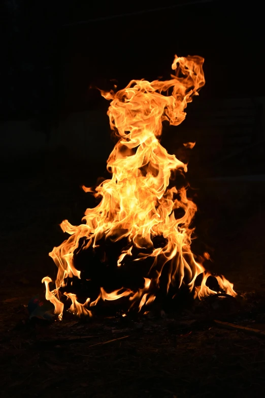 a fire is lit up in the dark, wearing tumultus flames, photo taken in 2018, engulfed in flames, avatar image