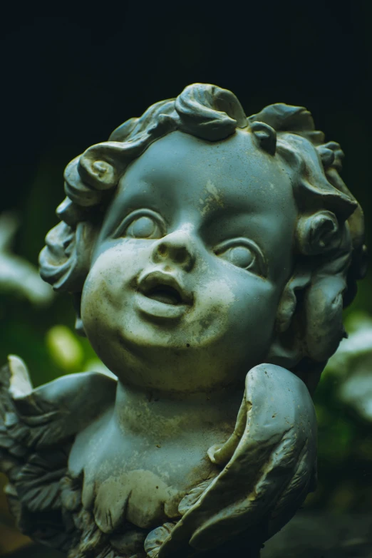 a close up of a statue of an angel, inspired by Correggio, pexels contest winner, winking, fetus, lush surroundings, evil looking