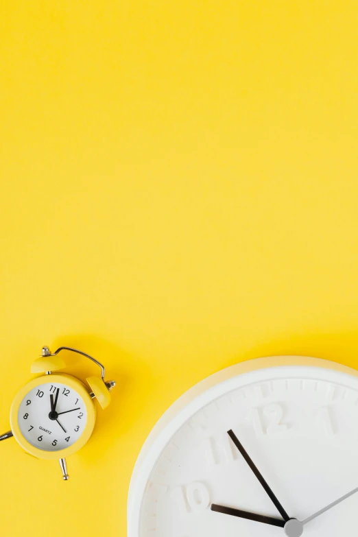 a white clock sitting on top of a yellow wall, thumbnail, on a yellow canva, a brightly colored, do