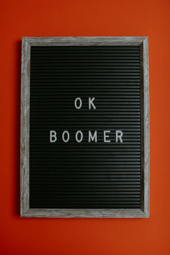 a black board with the word ok boomer written on it, a poster, trending on unsplash, elderly, bomberman, new mexico, welcome